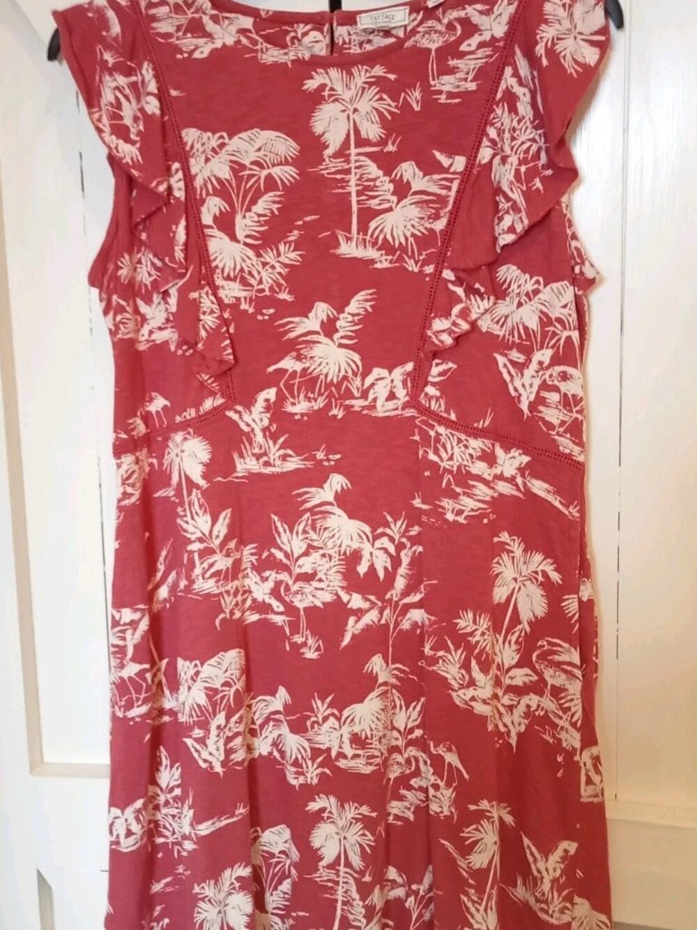 Jeremy's knitted sweater, faded coral-colored dress